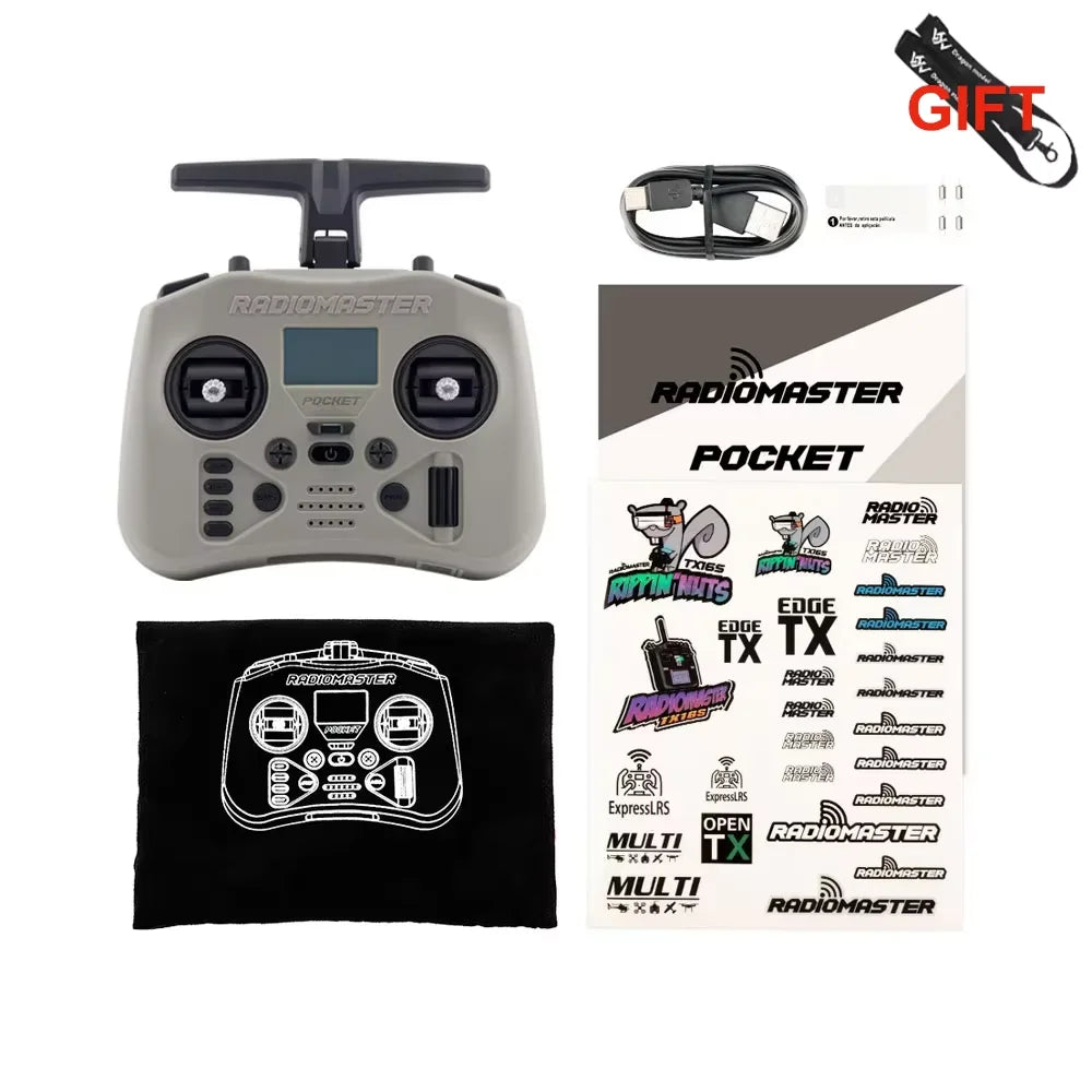 Radiomaster Pocket 2.4G Hall Gimbal ELRS/CC2500 transmitter in grey with detachable joysticks, USB cable, stickers, and black pouch.