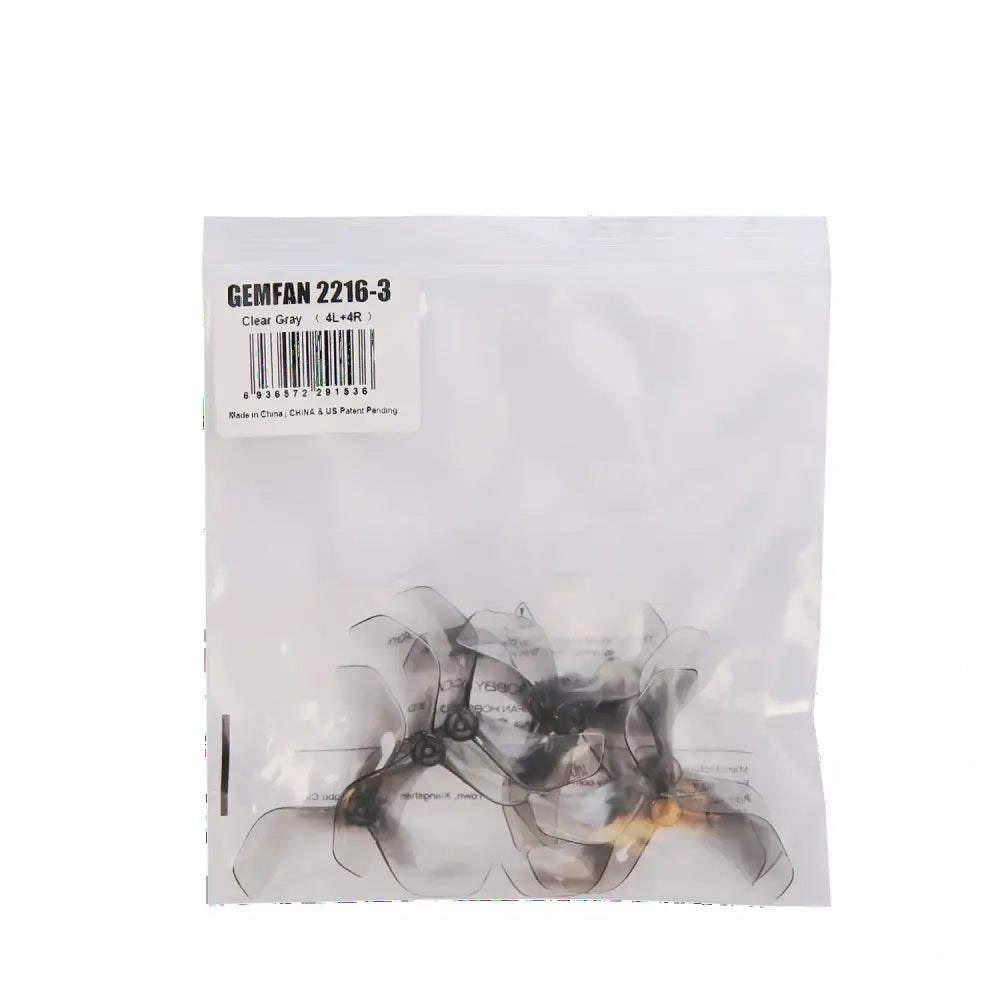 Hélices Gemfan 2216-3 transparentes grises à 3 pales pour drones FPV, emballées.